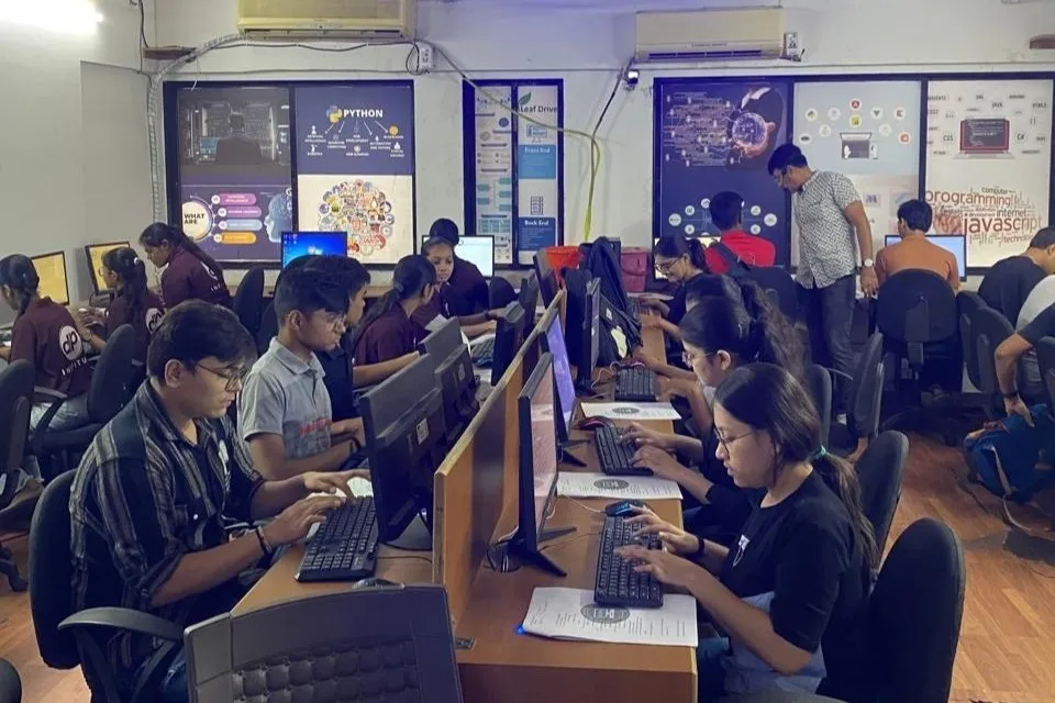 Classroom Guidance: One-on-one practical computer coaching in class at ECWDS computer classes, Surat